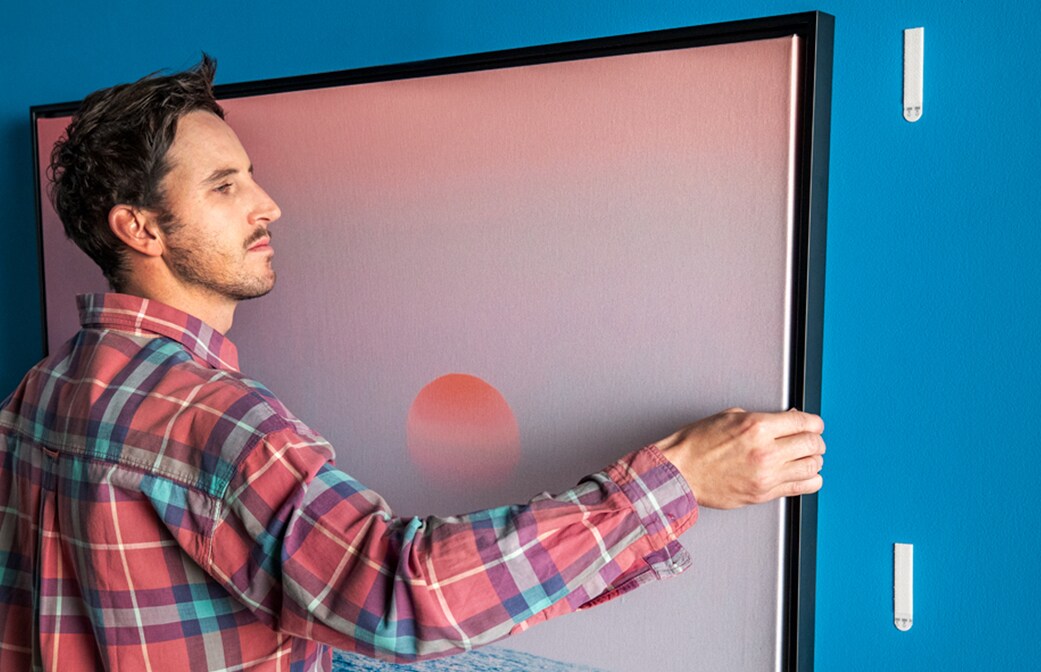 Command picture hangers hold strongly on a variety of surfaces, including paint, wood, tile and more