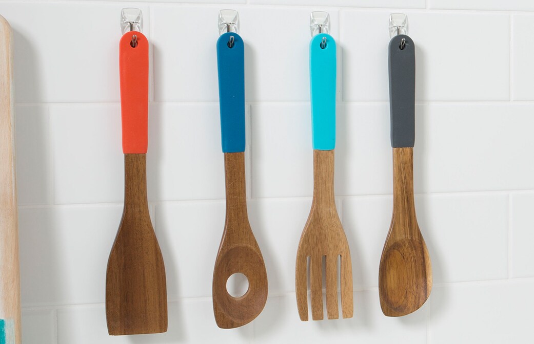 command clear adhesive wall hooks to hang spatulas on kitchen wall