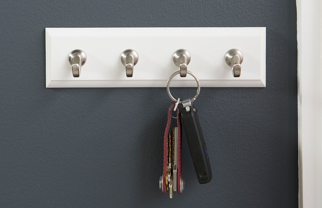 image of command decorative adhesive wall hooks with a black or brushed metal finish