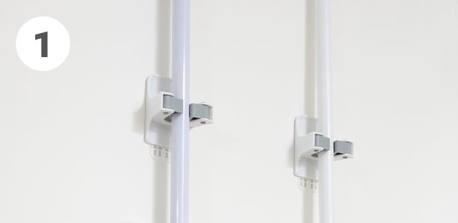 storage rack for brooms and mops using Command
