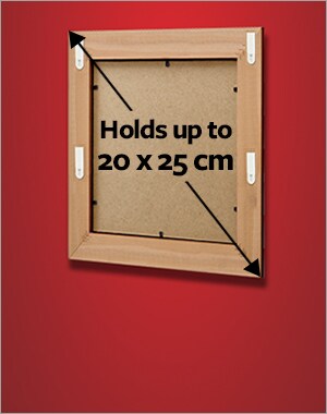 A frame holding a maximum size of 20 x 25 cm using 4 sets of small picture hanging strips.