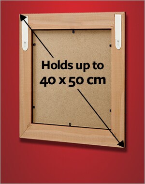 A frame holding a maximum size of 40 x 50 cm using 2 sets of large picture hanging strips.