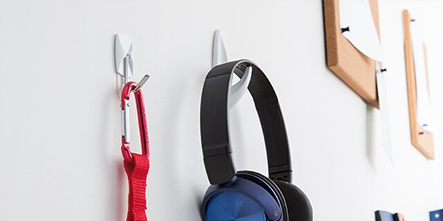 adhesive wall hooks to organise your kitchen pantry