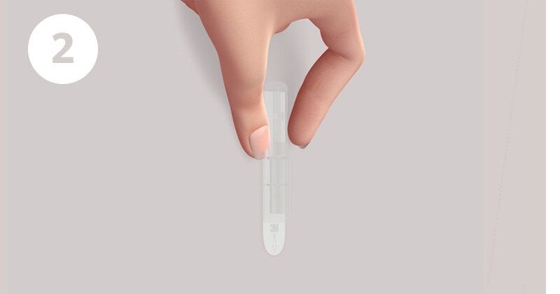 Gently hold hook or mounting base in place
