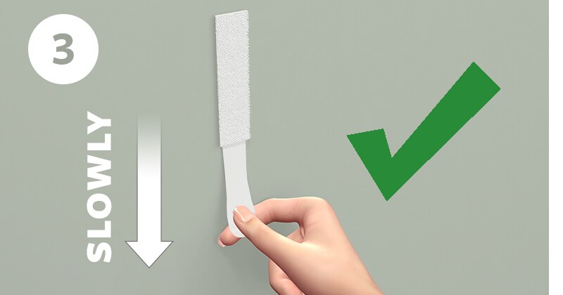 Step 3 of removing command strips
